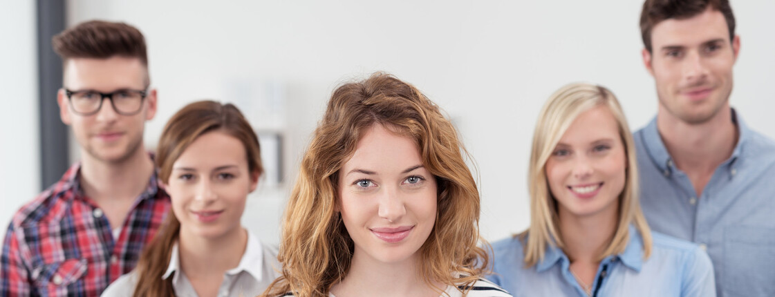 Five Young Business People Smiling at the Camera